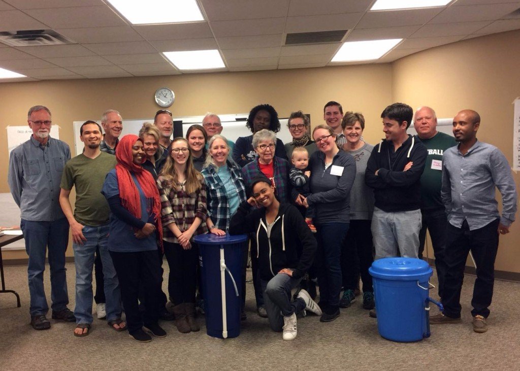 The volunteers, board members, trainers, and graduating class of AVFCW's 2018 Water Workshop.
